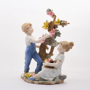 CHILDREN PICKING FLOWERS