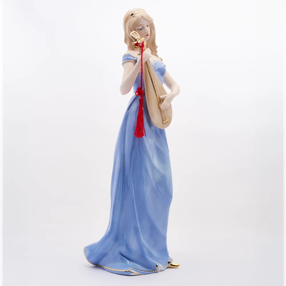 WOMAN PLAYING THE MANDOLIN