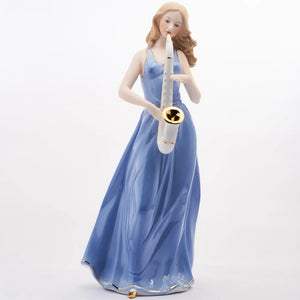 WOMAN PLAYING THE SAXOPHONE